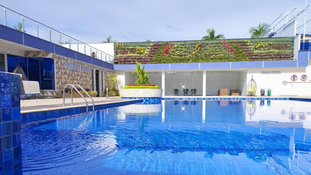 Hotel Royal Elim International Кали Экстерьер фото The swimming pool at the hotel