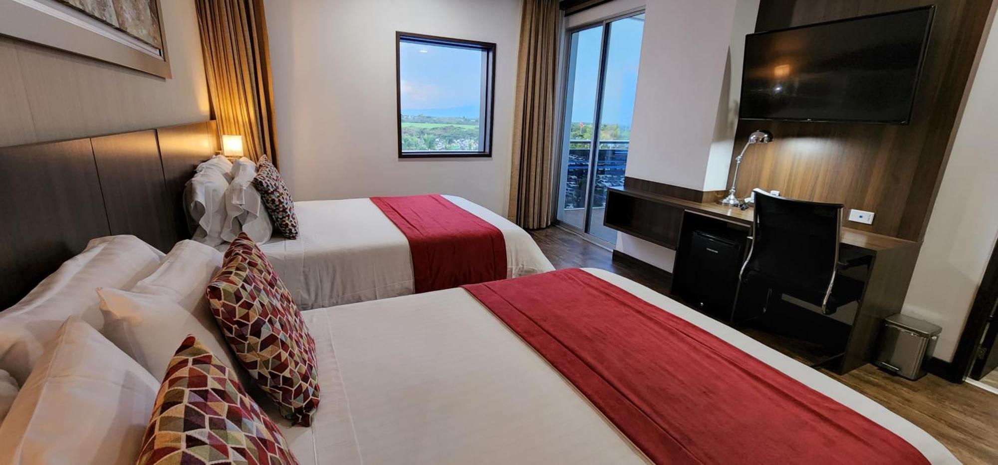 Hotel Royal Elim International Кали Экстерьер фото A guest room at the hotel