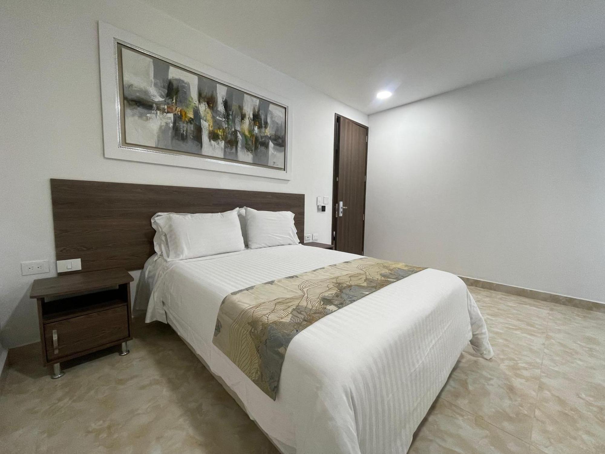 Hotel Royal Elim International Кали Экстерьер фото A bedroom in a hotel